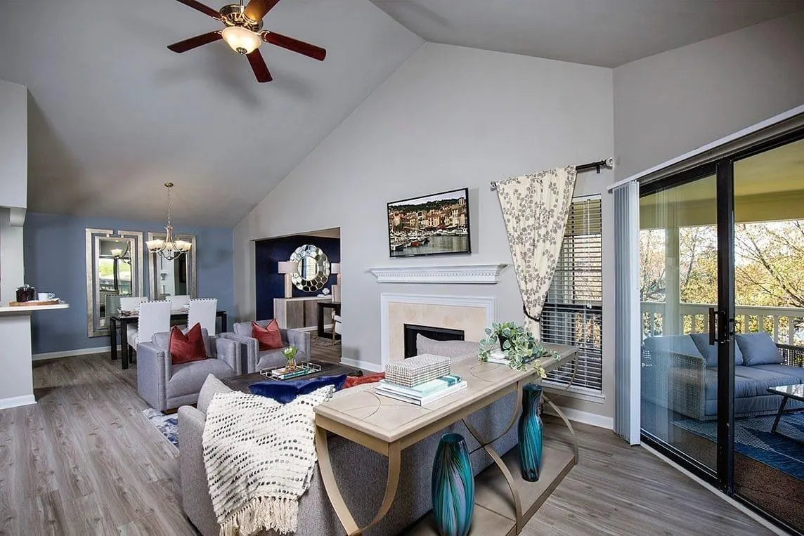 Living area with wide-plank hardwood flooring installed by Interior Solutions