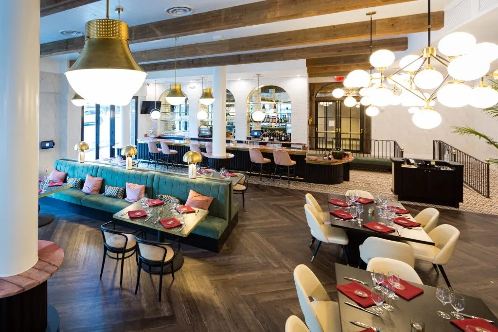 Commercial hospitality interior with patterned flooring installed by Interior Solutions